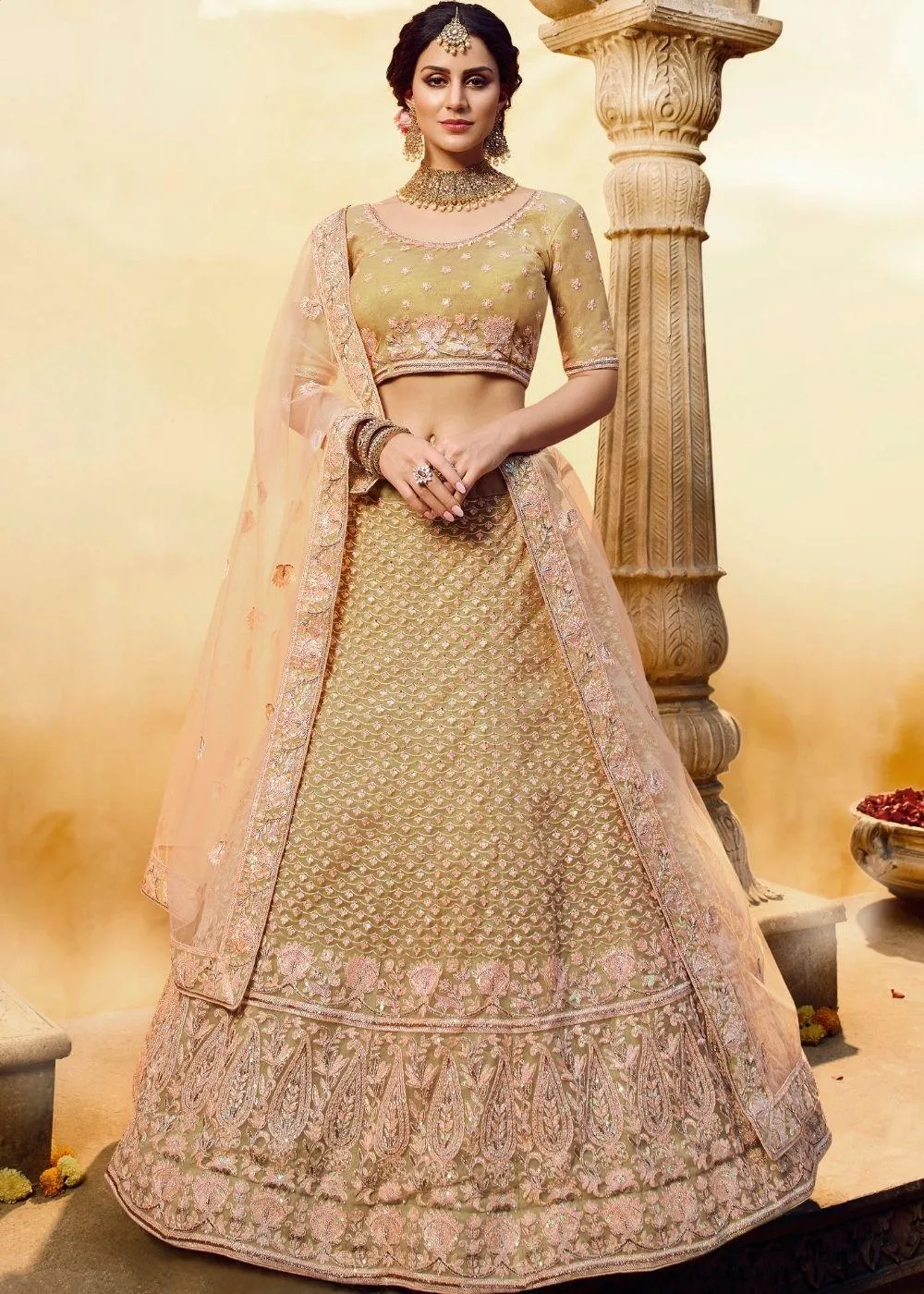 Golden Silk and Soft Net Bridal Lehenga Choli with Resham Embroidery and Aari work